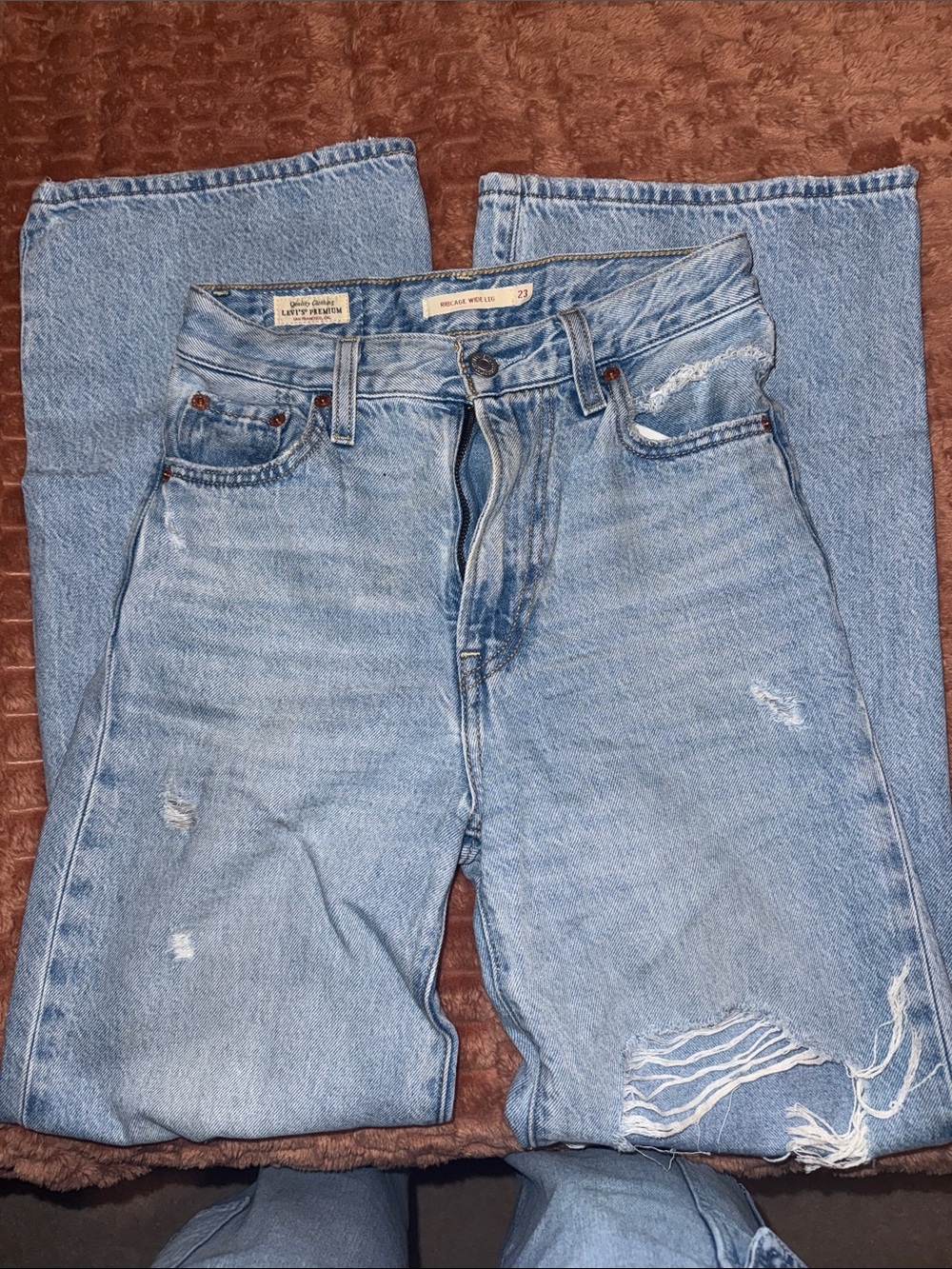 Levi's Light Blue Straight Men’s Jeans with Distressed Hem